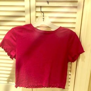 Rosy red cropped ruffled top.